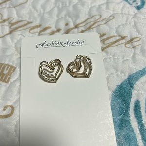 Gold with hint of silver heart shaped earring NWT never worn